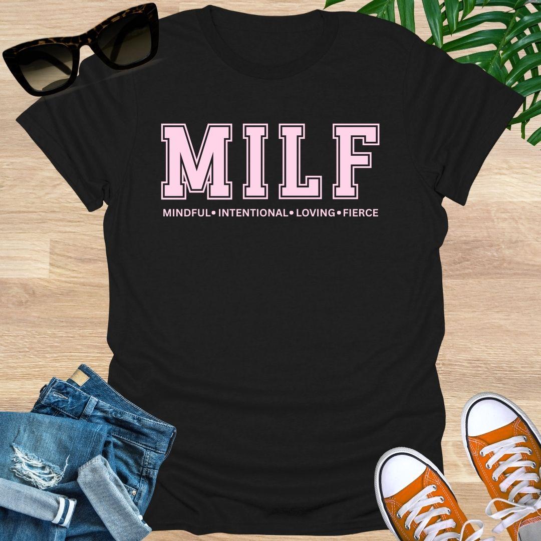 Black t-shirt with pink text 'MILF: Mindful, Intentional, Loving, Fierce"