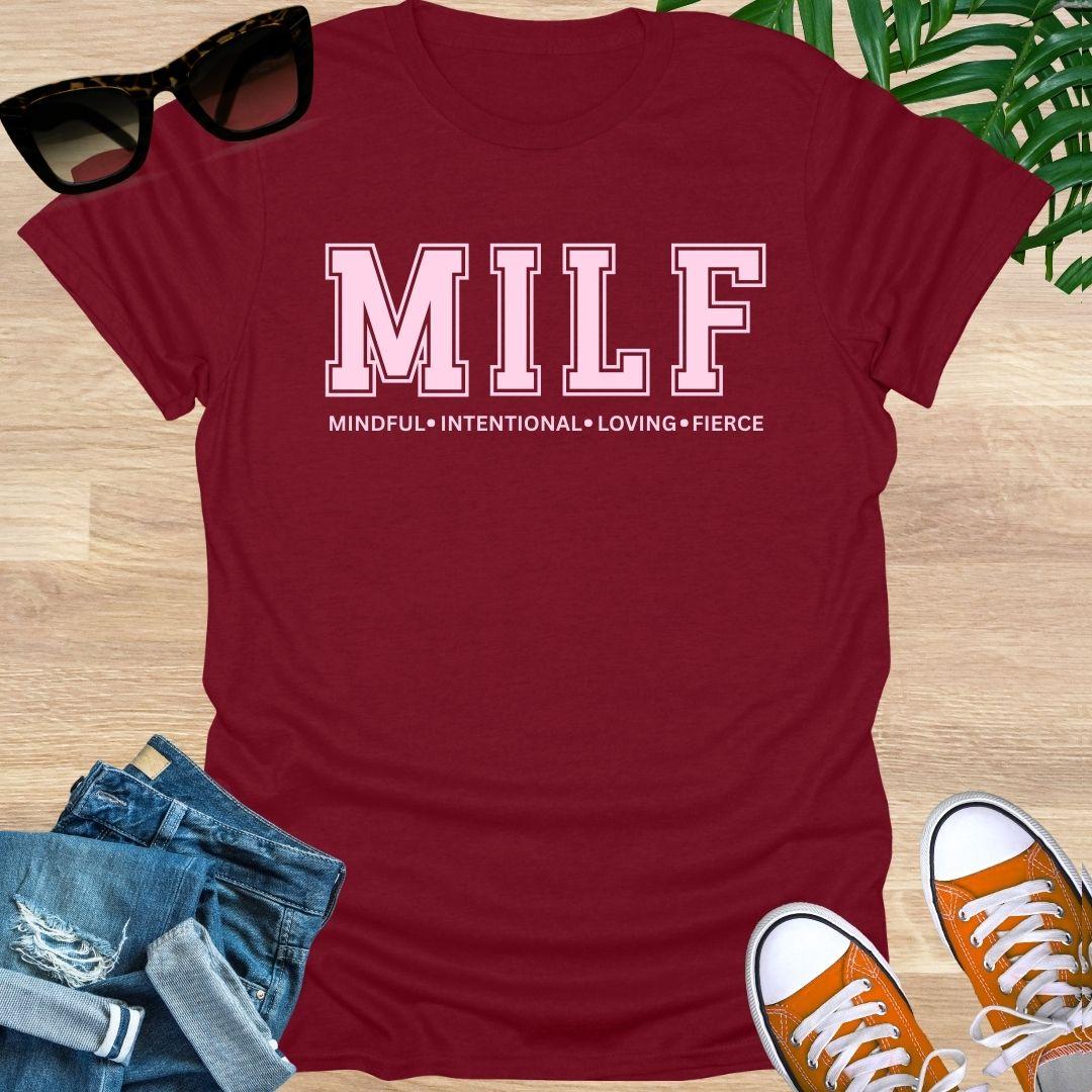 Red t-shirt with pink text "MILF: Mindful, Intentional, Loving, Fierce"