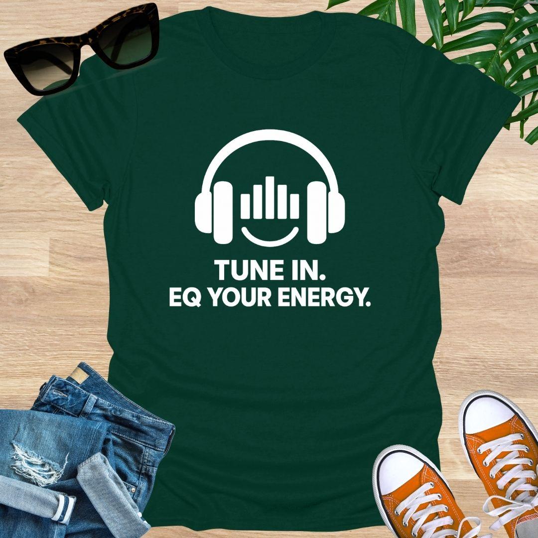 Green t-shirt with headphones graphic and text 'Tune In. EQ Your Energy.