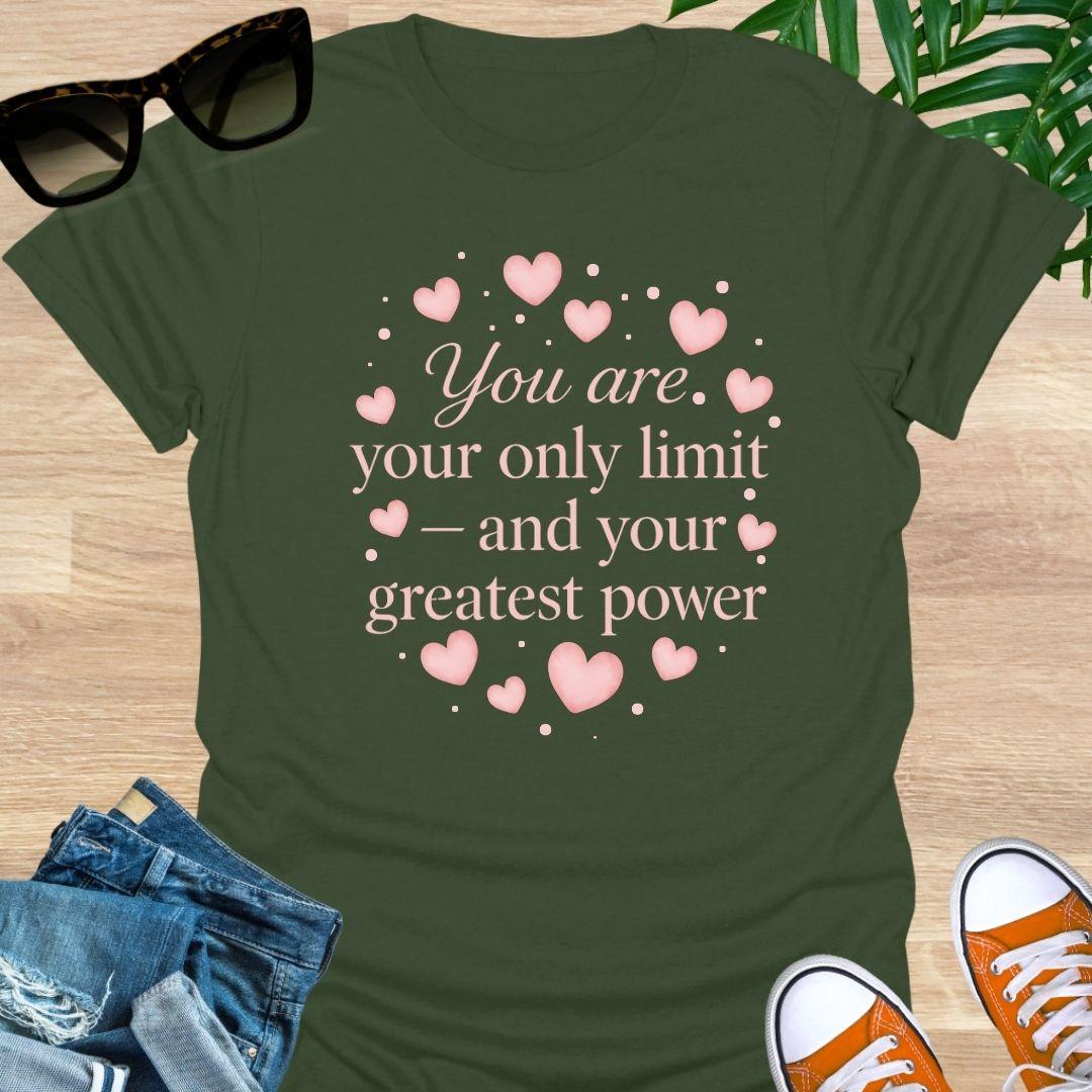 Pink hearts around the quote “You are your only limit—and your greatest power” on a military green unisex tee.