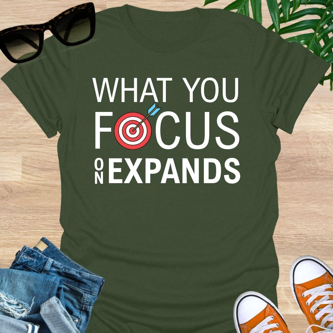 What You Focus On Expands Unisex T-Shirt