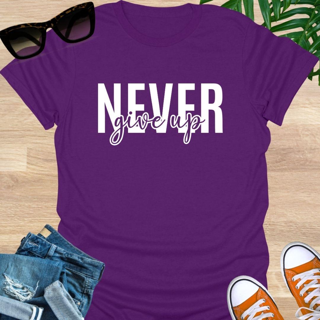 Purple tee with white varsity “NEVER” and script “give up” motivational design.