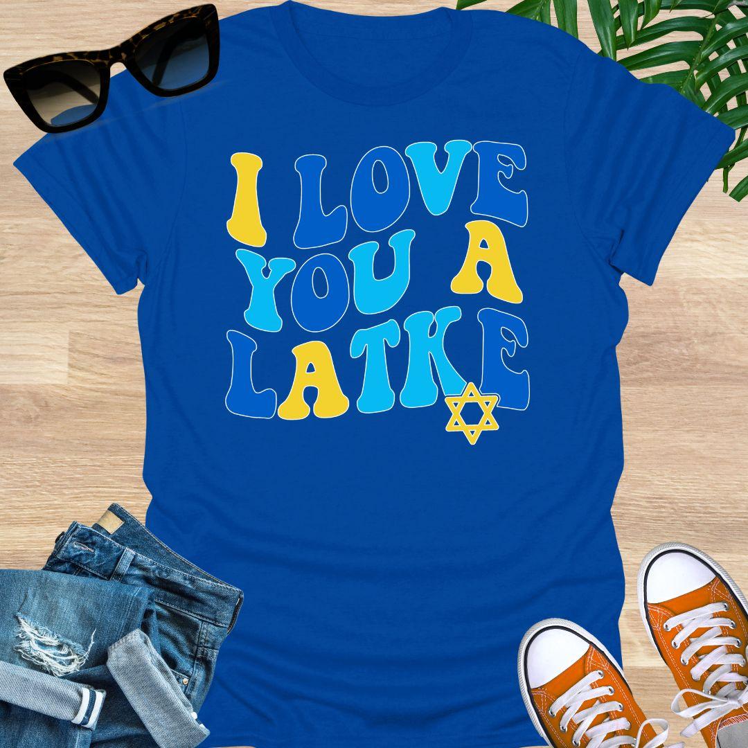Retro blue and gold “I Love You a Latke” text with a small Star of David on a blue unisex Hanukkah tee.