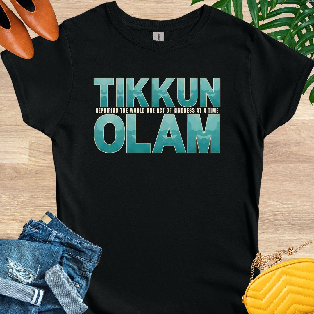 “Tikkun Olam” teal text tee with line “repairing the world one act of kindness at a time”; Jewish kindness black graphic shirt.