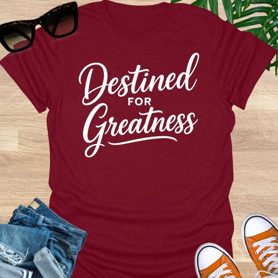 White script text reading “Destined for Greatness” on a red motivational graphic tee.