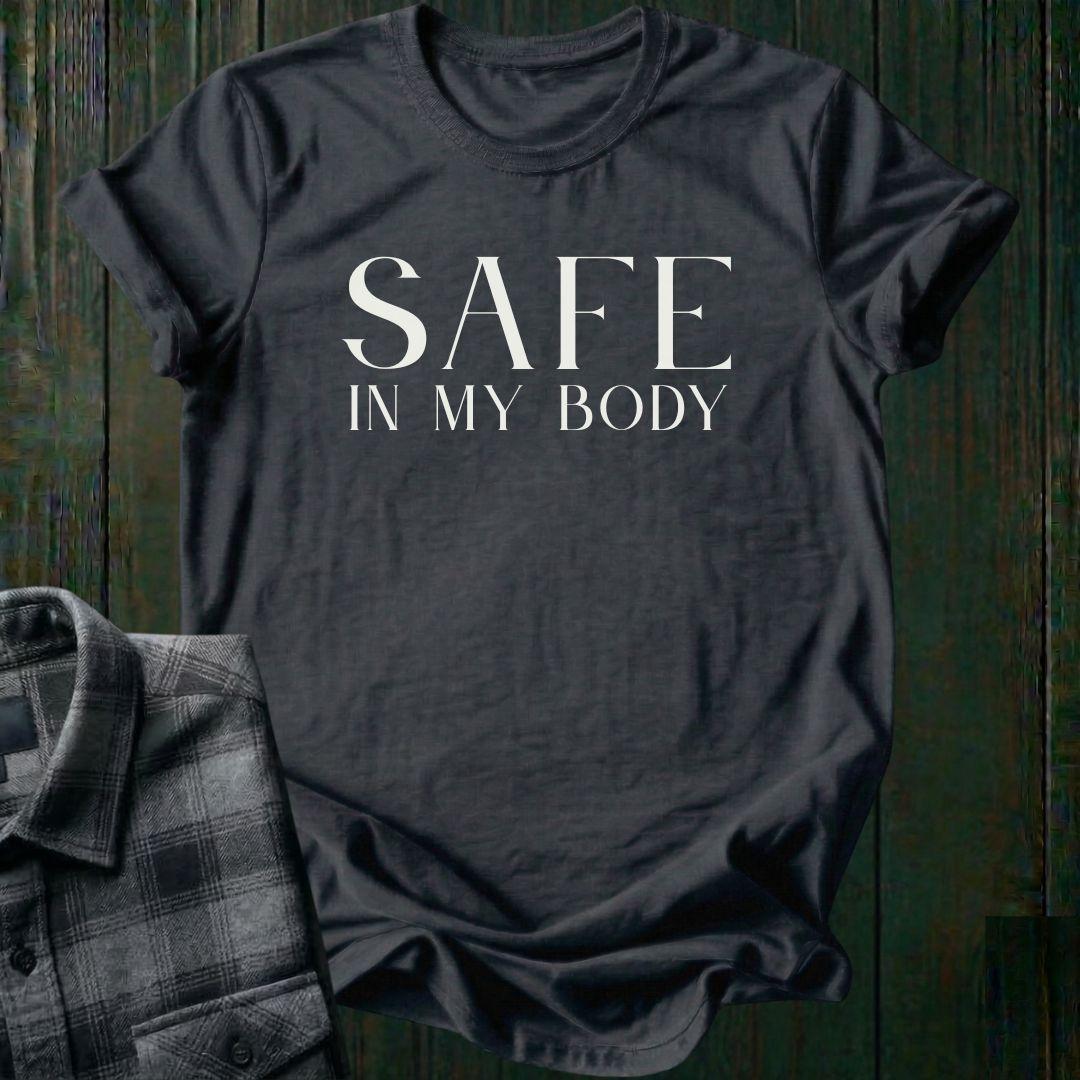 Minimalist typography design featuring the phrase "Safe in My Body" in elegant serif lettering on a charcoal tee