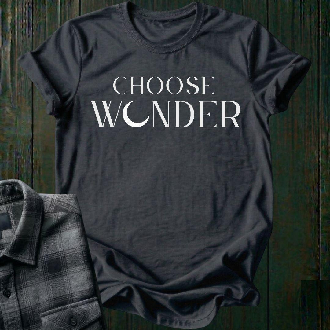 Minimalist typography design featuring the phrase "Choose Wonder" in elegant serif lettering on a charcoal tee