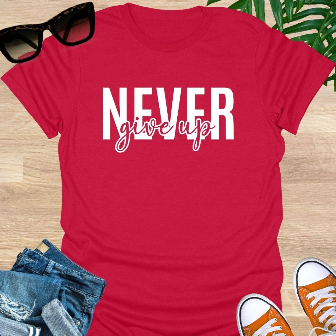 Red tee with white varsity “NEVER” and script “give up” motivational design.