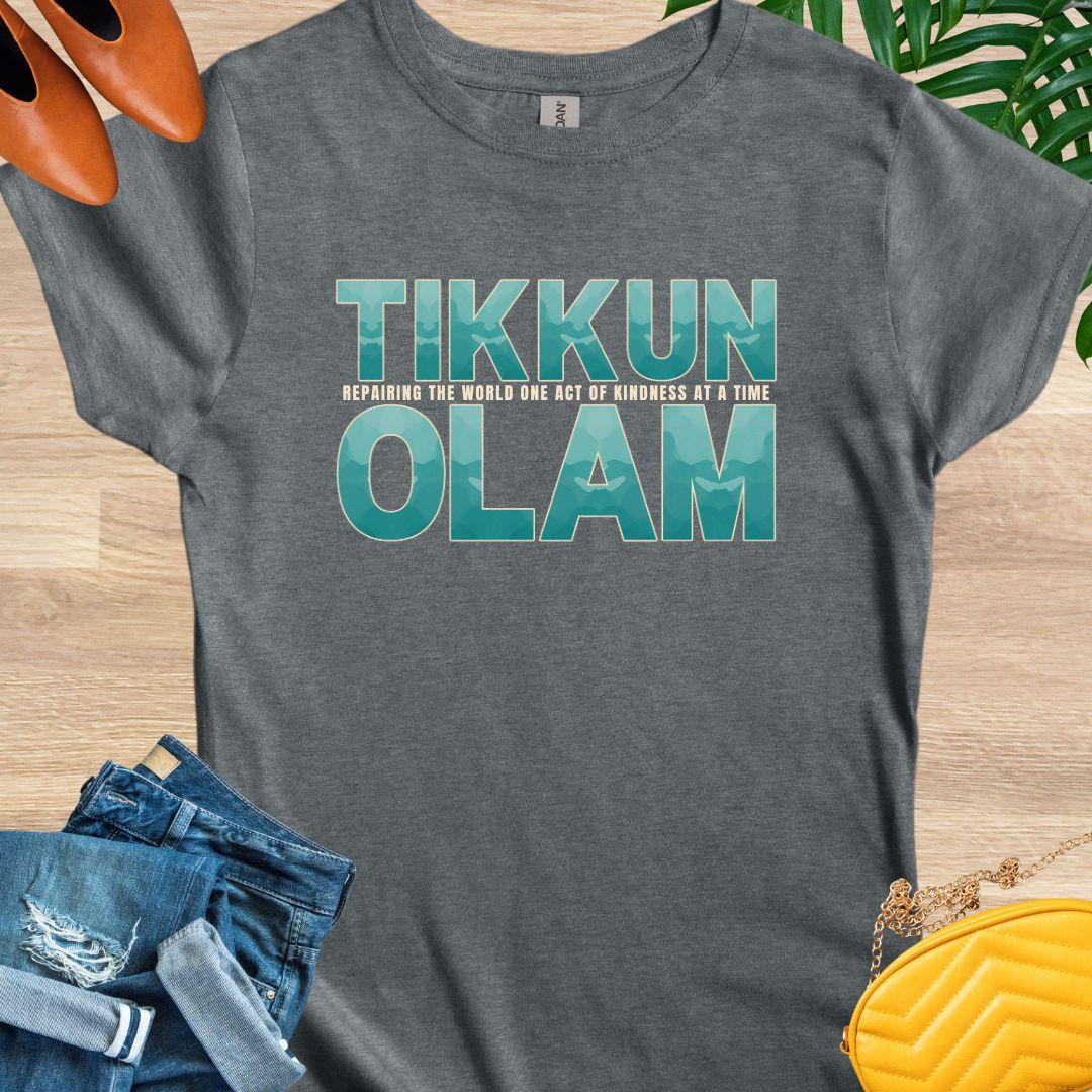 “Tikkun Olam” teal text tee with line “repairing the world one act of kindness at a time”; Jewish kindness dark heather graphic shirt.