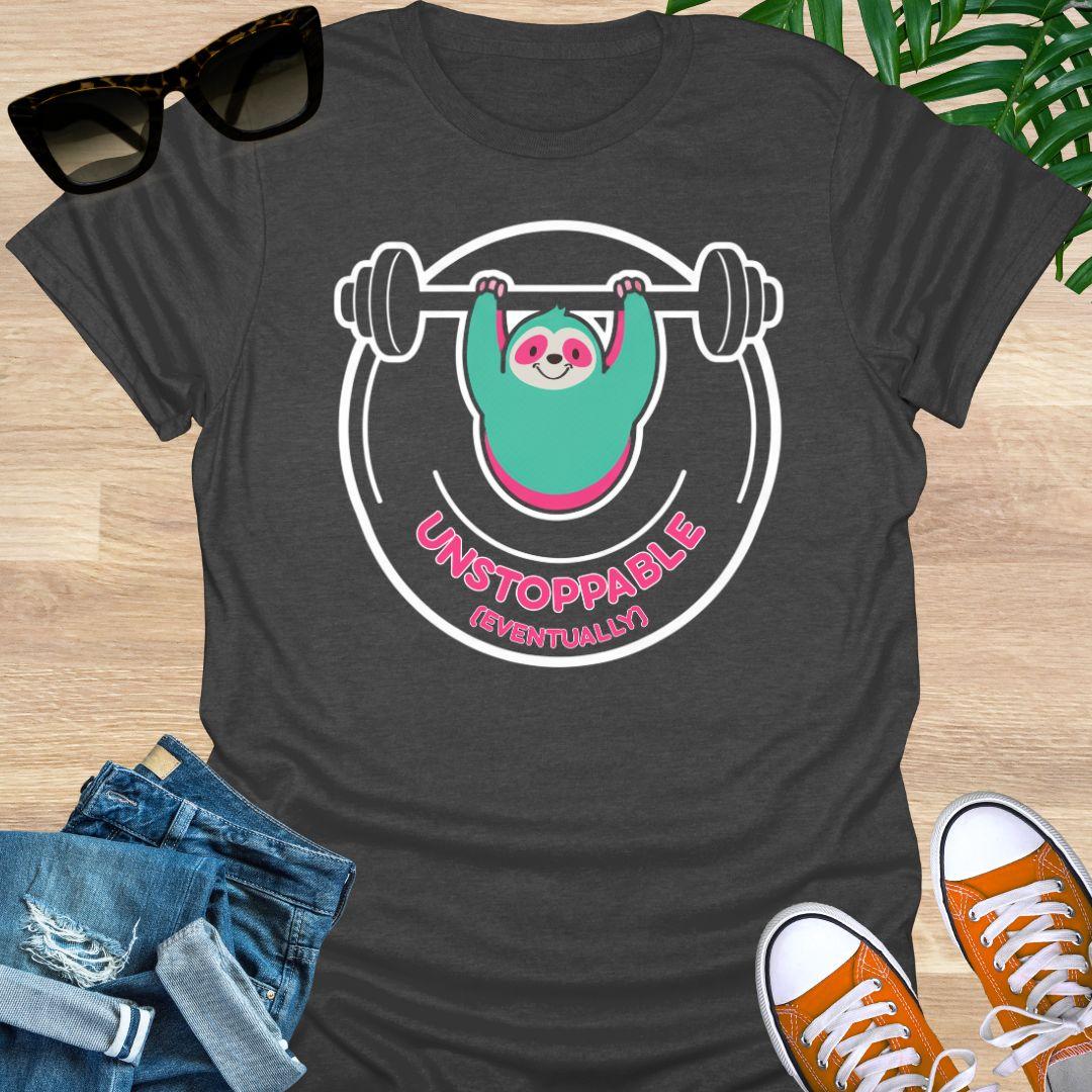 Cute sloth lifting barbell with Unstoppable (Eventually) message symbolizing persistence, patience, motivation, and steady progress on a heather gray unisex shirt