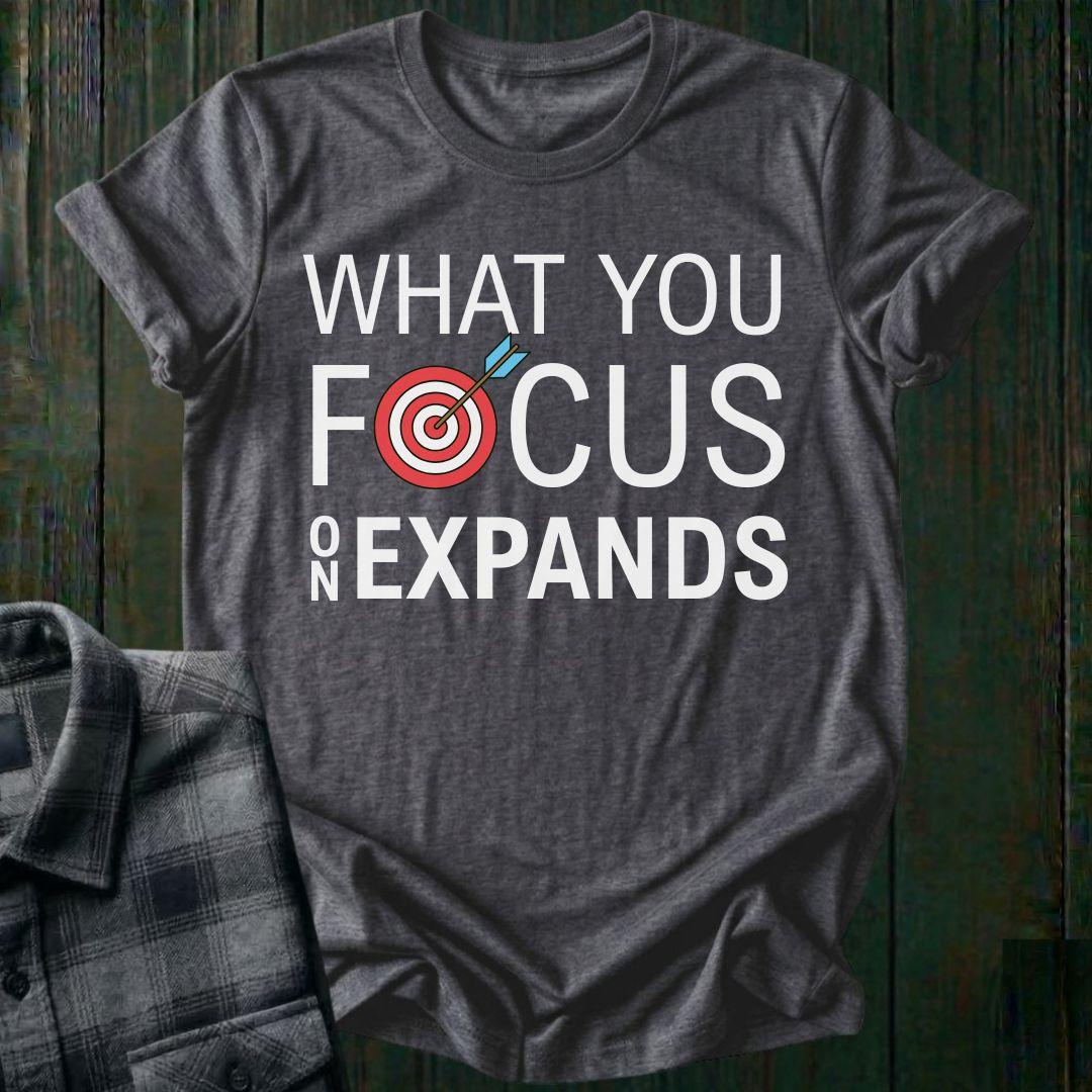 What You Focus On Expands Unisex T-Shirt