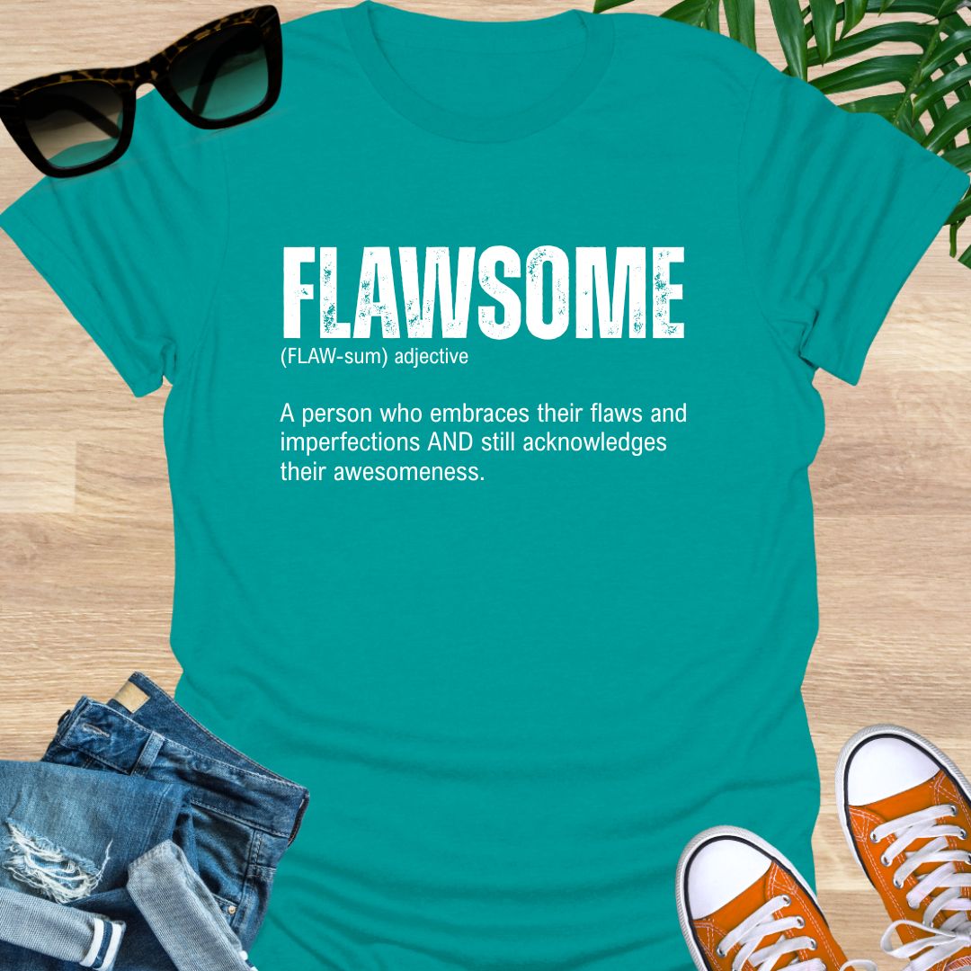 Teal unisex t-shirt with  “FLAWSOME” definition in bold white type, embrace flaws and awesomeness.