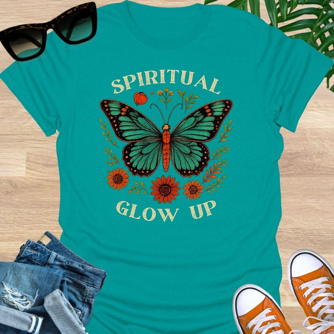 Spiritual Glow Up tee with vintage butterfly and floral  accents on a jade dome unisex shirt