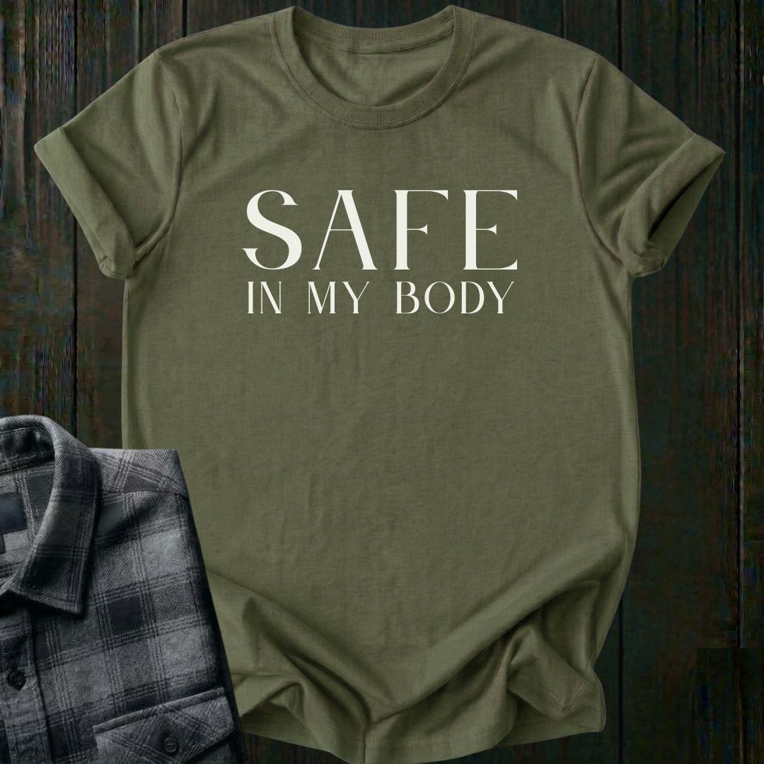 Minimalist typography design featuring the phrase "Safe in My Body" in elegant serif lettering on a military green tee