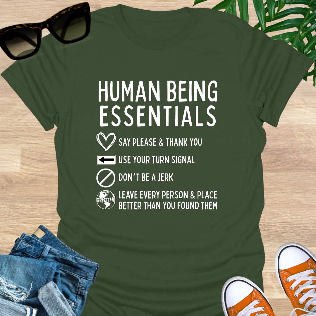 Funny “Human Being Essentials” checklist, please and thank you, turn signal, don’t be a jerk, leave it better, white icons on military green unisex tee.