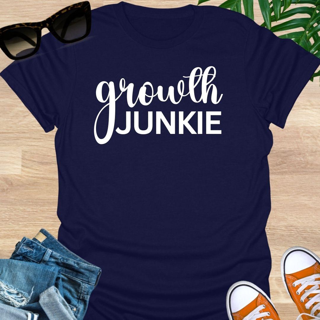Navy blue t-shirt with Bold “Growth Junkie” white text 