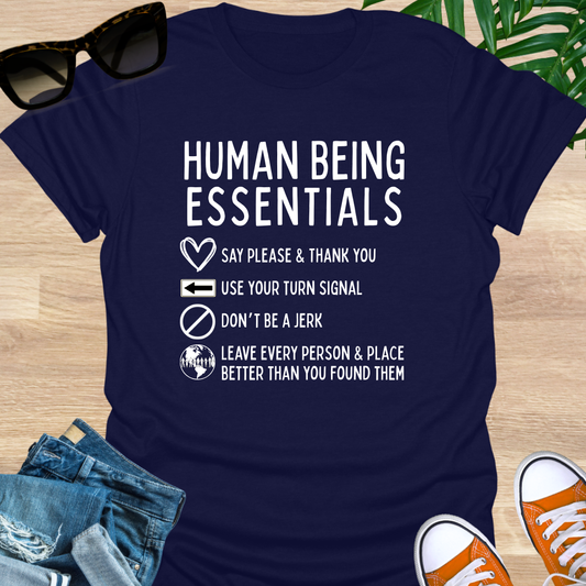 Funny “Human Being Essentials” checklist, please and thank you, turn signal, don’t be a jerk, leave it better—white icons on navy unisex tee.