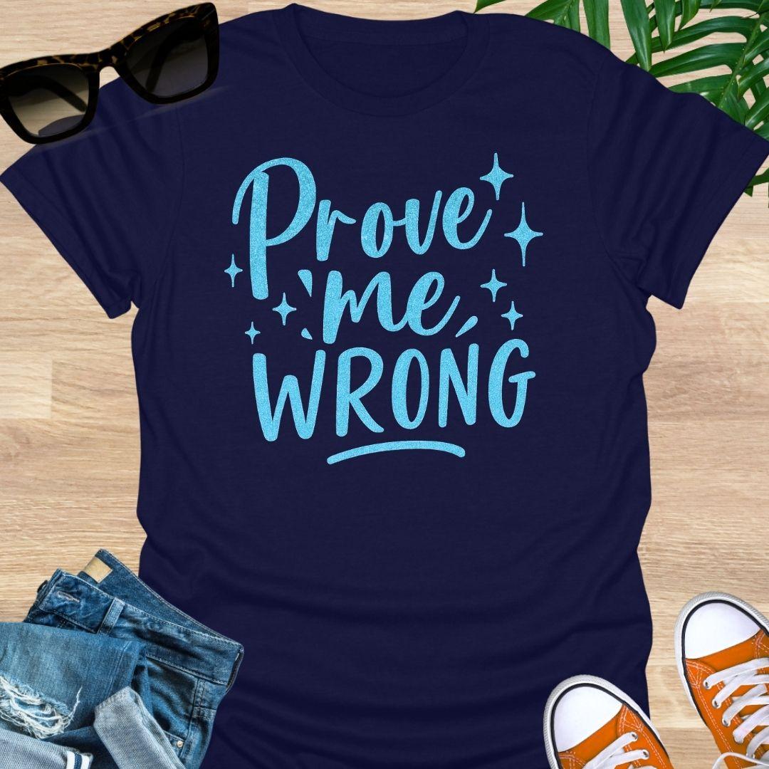 “Prove Me Wrong” blue glitter text design on a navy unisex motivation tee