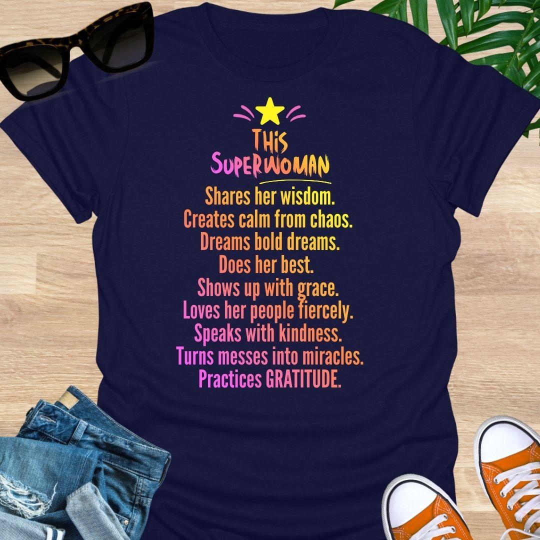 "This Superwoman” rainbow text with star—gratitude quote on a navy unisex tee