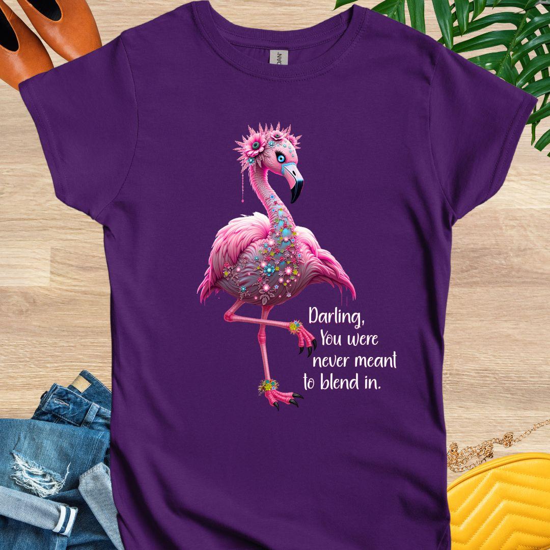 Floral pink flamingo with quote “You were never meant to blend in” on empowerment and confidence on a purple tee