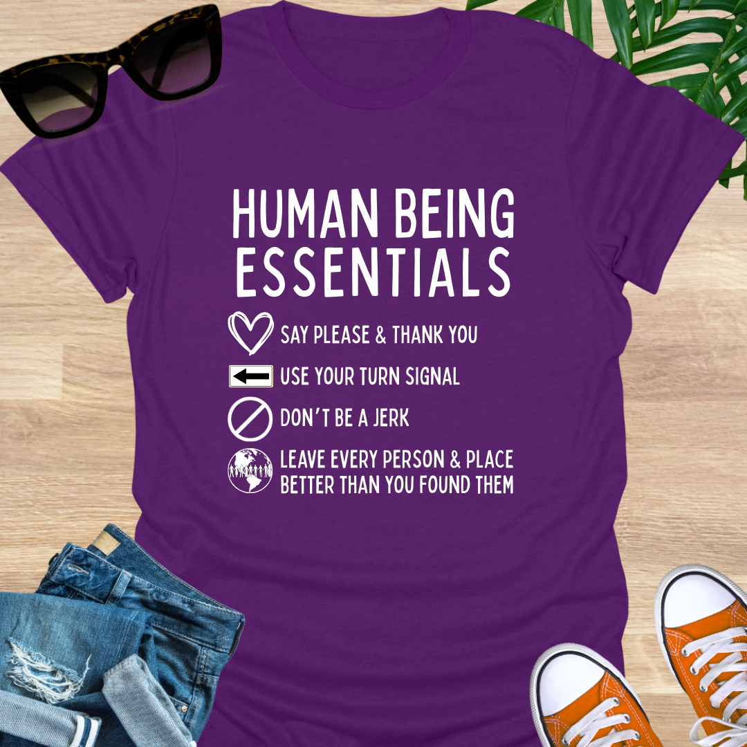 Funny “Human Being Essentials” checklist, please and thank you, turn signal, don’t be a jerk, leave it better, white icons on purple unisex tee.