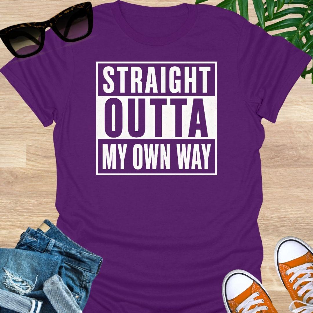 White block text reading “Straight Outta My Own Way” on a purple unisex  tee