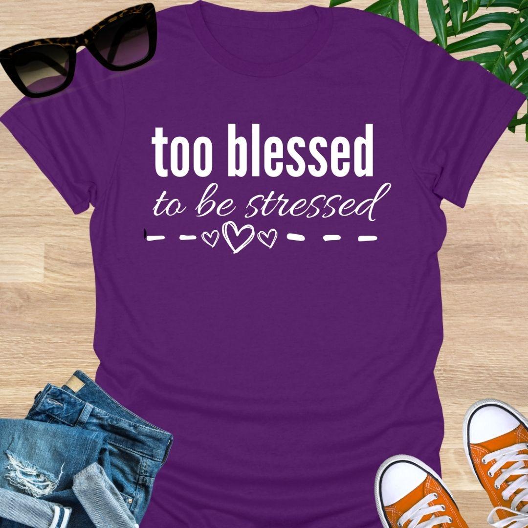 “Too Blessed to Be Stressed” text tee with hand-drawn hearts, white lettering on a purple unisex T-shirt.