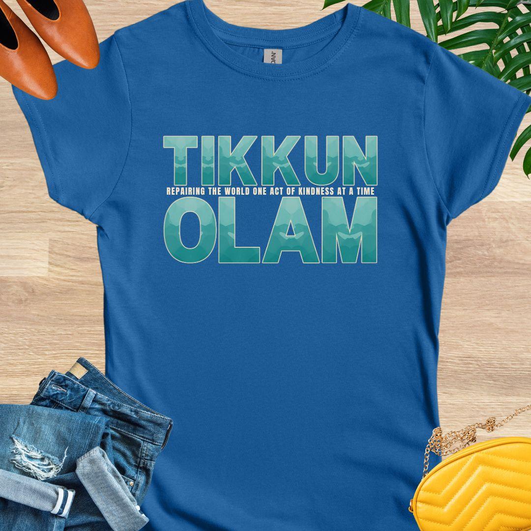 “Tikkun Olam” teal text tee with line “repairing the world one act of kindness at a time”; Jewish kindness on a blue graphic shirt.