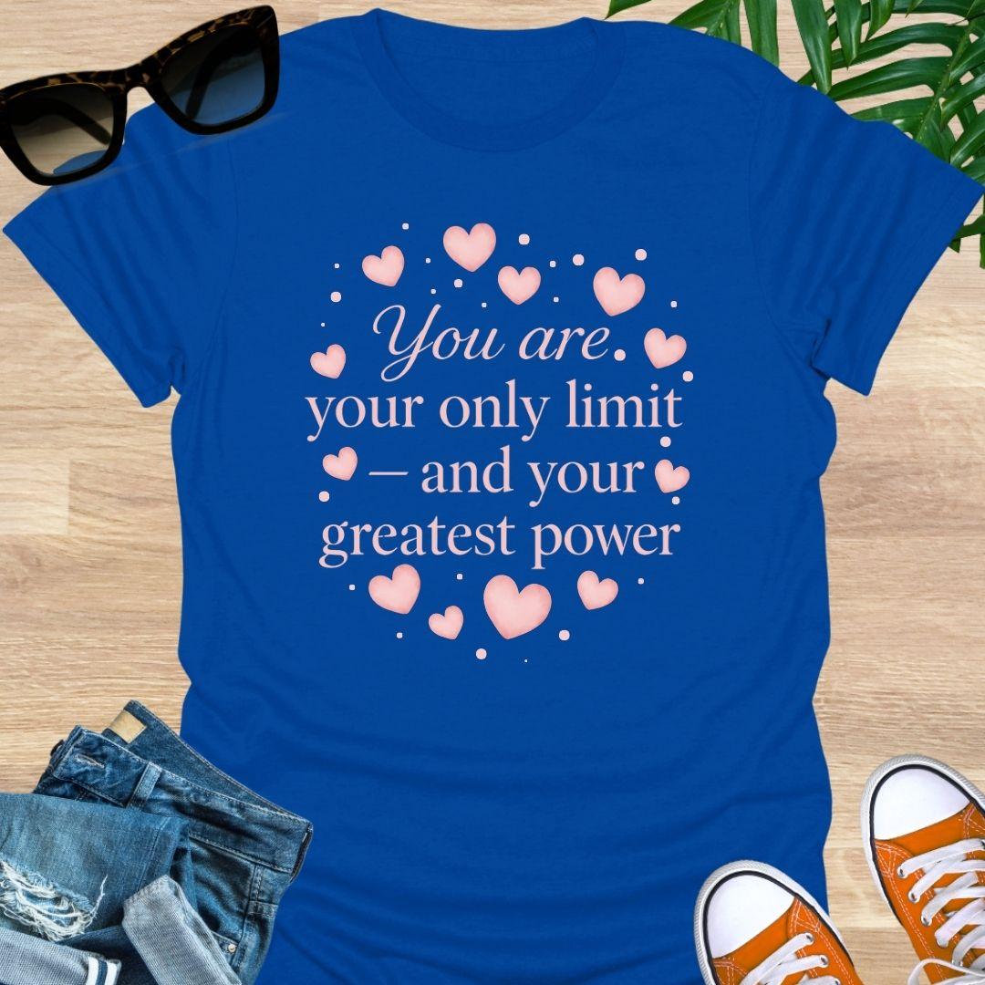 Pink hearts around the quote “You are your only limit—and your greatest power” on a blue unisex tee.